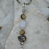 Shell, pearl, and quartz keychain with bird charm. $10