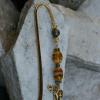 Glass hook style bookmark with elephant charm. $15