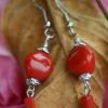 Red coral earrings. $!5