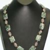 Green and white jasper necklace accented with glass beads. Chic collection. 27" long. [Depression, stamina, fertility, love, prosperity] $55