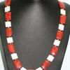 Sponge coral and shell necklace. Chic collection. 27" long. [Stress, courage, honesty] $60 