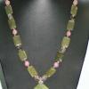 New jade and rhodochrosite necklace highlighted with jade pendant. Chic collection. 24" long. [Protection, luck, longevity, wisdom, self-esteem, and confidence] $65