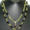 Smoky quartz and green citrine highlighted with a smoky quartz pendant. Chic collection. 18" long (inner strand). $65