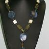 Circular blue shell pendants highlighted with shell, jasper, and glass bead necklace. Chic collection. 22" long. [Stress, courage, honesty, love, prosperity, and skills] $60