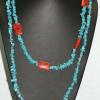 Turquoise necklace accented with sponge coral. Chic collection. 25" long (inner strand). [Mood swings, prosperity, success, depression, stamina, and fertility] $55