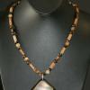 Jasper, shell, and glass bead necklace highlighted with unique shell pendant. Chic collection. 21"long. [Stress, courage, honesty, prosperity, love, and mental overload] $55