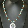 Turquoise and shell necklace with shell pendant. Chic collection. 23" long. [Moodswings, success, love, prosperity, and mental overload] $55