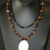 Tiger's eye necklace with shell pendant. Chic collection. 18" long (inner strand) and 22" long (outer strand). [Success, protection, love, prosperity, and mental overload] $60